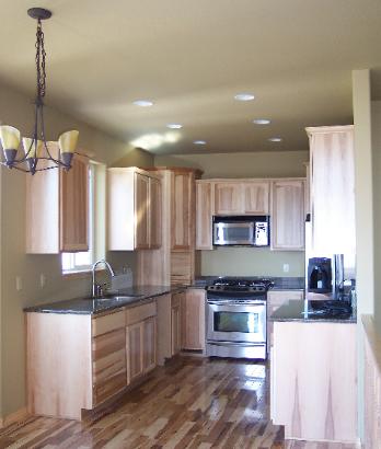Kitchen w/ Hickory cabinets and flooring